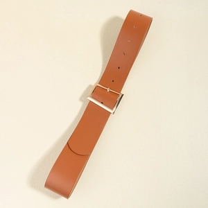 Close-up of a brown leather waist belt featuring a gold square metal buckle and adjustable holes