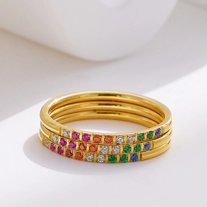 Three-piece stackable gold stainless steel rings set with colorful rainbow cubic zirconia