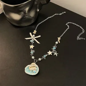 Summer ocean themed ceramic beaded necklace with shell pendant and starfish detail