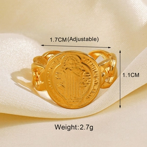 Macro view of adjustable Saint Benedict medal ring in gold with detailed chain band
