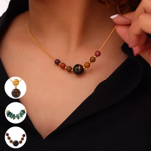 Titanium steel beaded necklace with tiger eye stone and agate, worn by a model