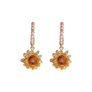 Elegant gold plated sunflower earrings with white pearls and yellow flower petals