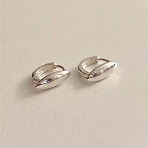 Detailed macro view of S925 sterling silver hoop earrings with olive leaf charm