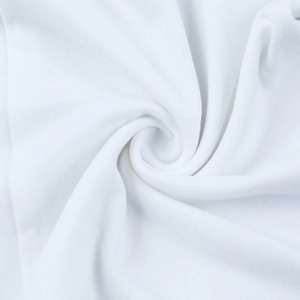 Close-up of white ribbed knit fabric showing soft texture and premium material detail