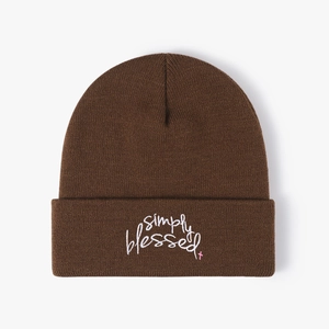 Deep brown Simply Blessed embroidered beanie hat with warm knit fabric and a pink cross