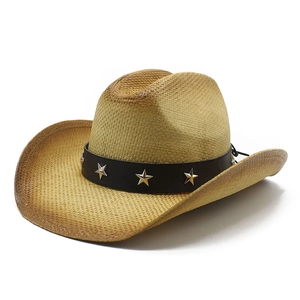 Handwoven straw cowboy hat with black leather band and silver star studs on white background