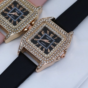 Detail view of square dial ladies watches with crystal bezels and leather straps
