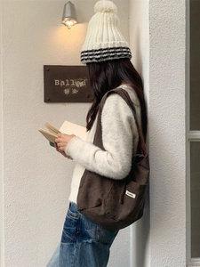 Minimalist dark brown corduroy tote bag for women in a vintage shoulder bag style
