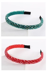 Detail of handcrafted multi-layer headband with dark green and red crystal beads