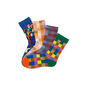 Detail view of four pairs of cotton crew socks with plaid and character patterns