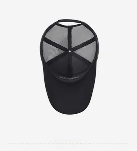 Detail of internal six-panel structure and breathable mesh of black baseball cap
