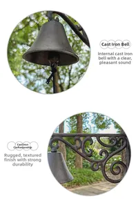 Detail of vintage cast iron doorbell with scroll motifs and rustic weathered texture