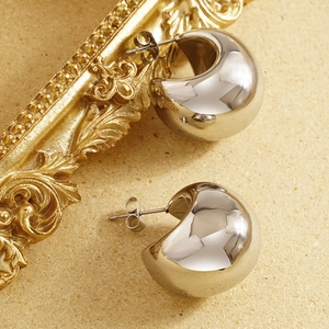 Polished silver hollow moon teardrop earrings in stainless steel on textured base