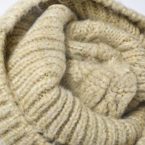 Thick beige striped knit beanie with premium plush mohair texture for winter warmth