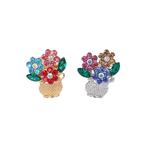 Elegant flower basket brooches with colorful rhinestones in gold and silver finishes