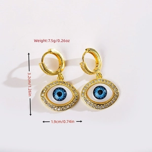 Golden evil eye hoop earrings with blue pupils and white rhinestones for women