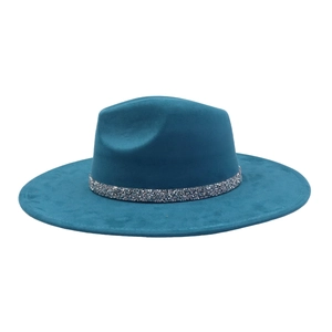 Close-up of dark teal suede fedora hat with a sparkling rhinestone decorative band