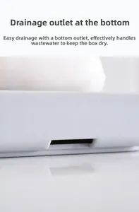 Detail view of the drainage holes on a grey plastic double-layer soap box bottom