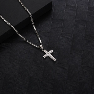 Hip hop silver cross pendant necklace with sparkling diamonds and box chain on dark gift box