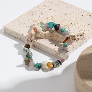 Macro detail of Bohemian stretch bracelet featuring multi-color natural gemstone chips