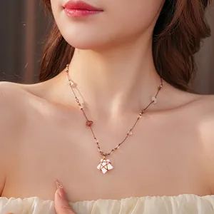 Collier ethnique avec pendentif étoile en oeil de tigre et perles minérales sur cordon