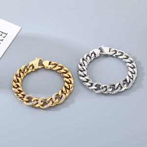 Detailed view of 13mm Cuban link bracelets in gold and silver with sparkling rhinestones