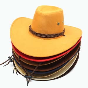 Stack of suede western cowboy hats in diverse colors with adjustable chin straps