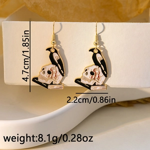 Detail showing dimensions of crow and skull gothic earrings with black enamel finish