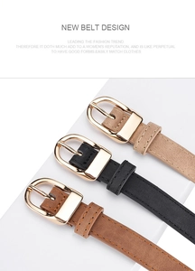 Detail of matte PU leather belts with gold buckles in brown, black, and beige colors
