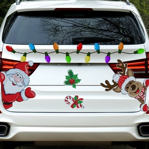Car rear detail showing reflective Christmas Santa and reindeer magnetic stickers set
