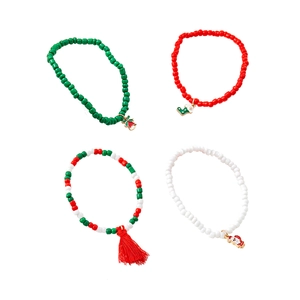 Detail of Christmas beaded bracelet with festive bells, Santa charms and tassels