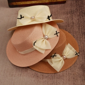 Straw sun hat with pearl chiffon bow in beige, pink, and brown color options