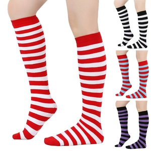 Detail of colorful striped knee high socks in red, black, blue, and purple colorways