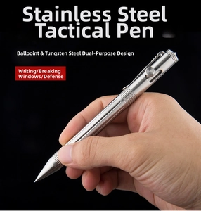 Detailed close-up of stainless steel tactical pen with tungsten steel glass breaker tip
