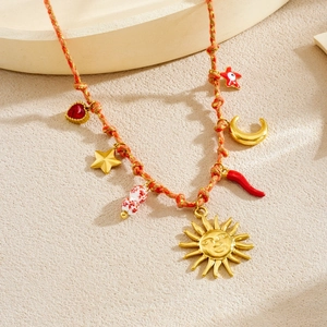 Bohemian colorful woven rope necklace with gold sun face and red chili charms