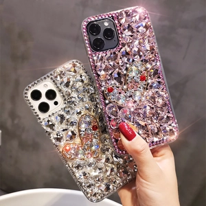 Sparkling rhinestone phone case with large heart design for iPhone 16/15 Pro Max models