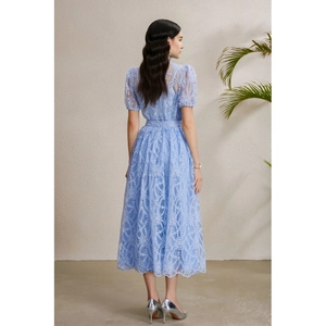 Light blue lace long dress with puff sleeves and ruffled hem, back view on model