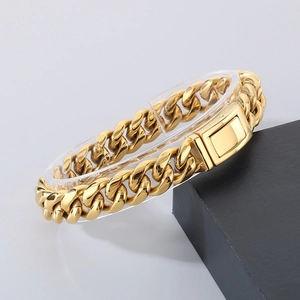 Detailed view of the 12mm golden Cuban link bracelet with a square box clasp closure