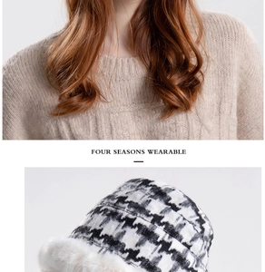 Detail of winter checkered bucket hat with white faux fur trim and soft plush texture