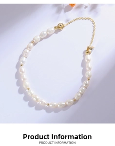 Macro shot of baroque freshwater pearls with gold bead spacers and adjustable clasp