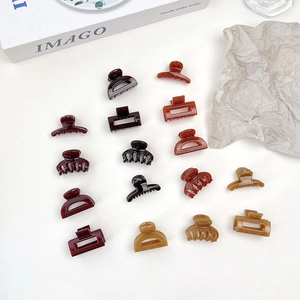 Detailed set of 15 pieces of jelly-textured hair clips in trendy earthy tones and shapes