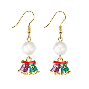 Detail of Christmas bell earrings with red bows, pearls, and colorful enamel charms