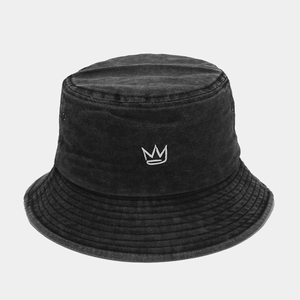 Detail of white crown embroidery on vintage washed black denim bucket hat with parallel stitching