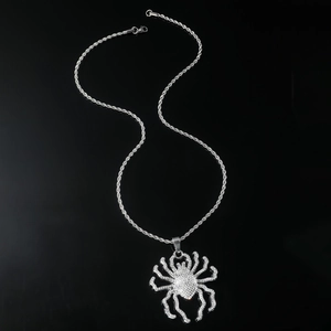 Iced out spider pendant necklace with clear crystals and silver twist chain for men