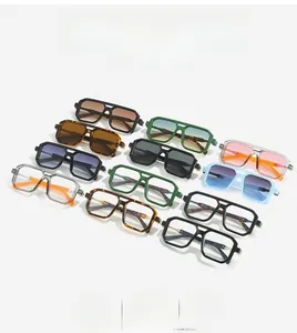 Detail view of square aviator sunglasses with double bridge and varied frame colors
