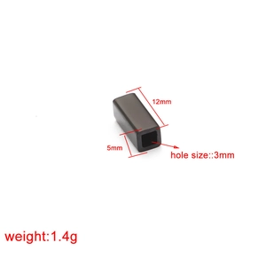 Detailed view of a black 12x5mm stainless steel rectangular bead with 3mm hole size