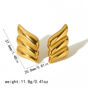 Polished 18k gold plated stainless steel wing earrings with dimensional wave design
