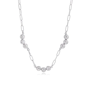 Detailed view of silver paperclip chain necklace with bezel-set round zircon stones