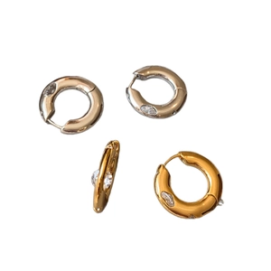 Minimalist gold and silver chunky hoop earrings with marquise-cut zircon stones
