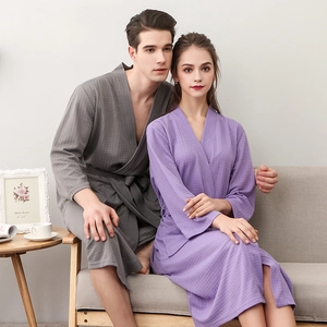 Matching waffle weave bathrobes in dark grey and purple with V-neck for couples